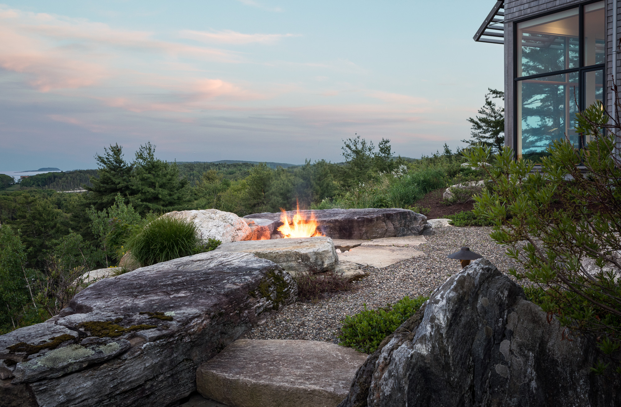 Thoughtfully designed garden with layered planting and inviting outdoor spaces