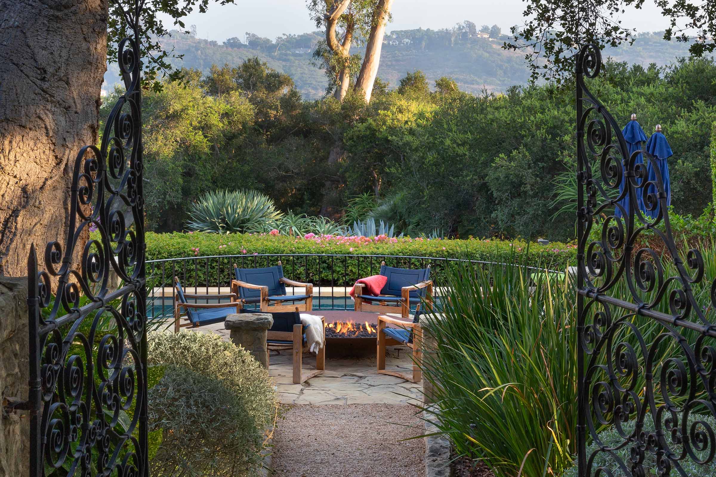 Serene garden retreat with layered planting, natural stone, and refined outdoor details